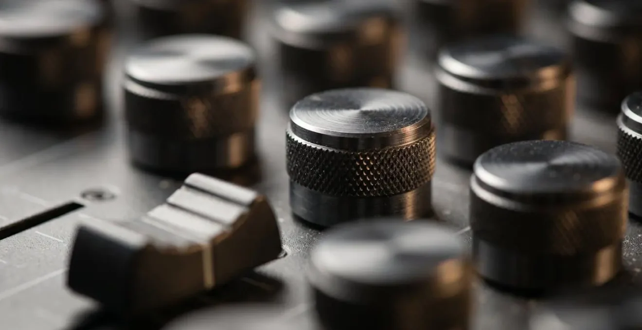 Extreme close-up of professional audio equipment surface texture, highlighting quality materials.