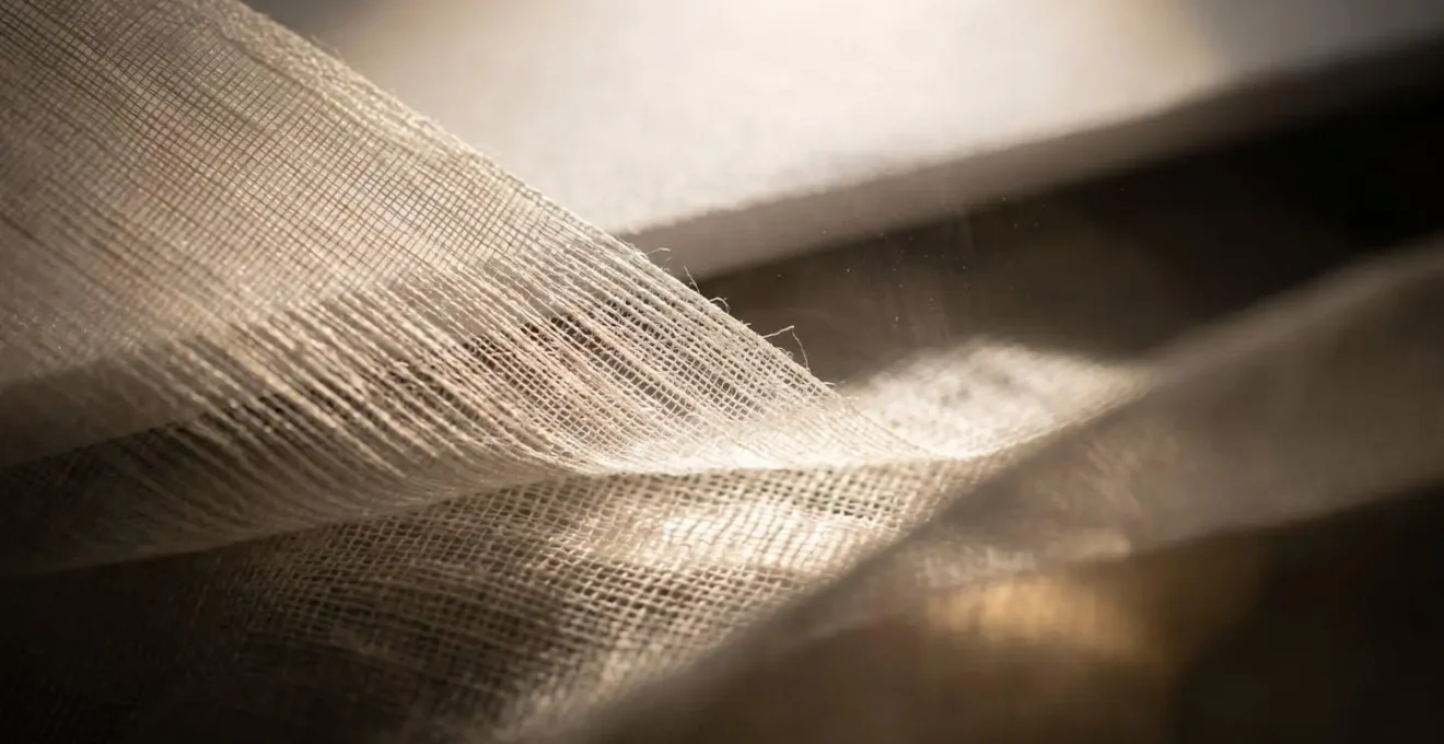 Close-up of LED panel bouncing light onto white foam core reflector with translucent fabric diffusion layer